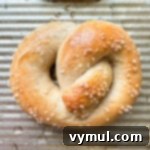 Homemade Soft Pretzels: Quick and Easy in 30 Minutes 12 traditional soft pretzel on a baking sheet, ready to eat