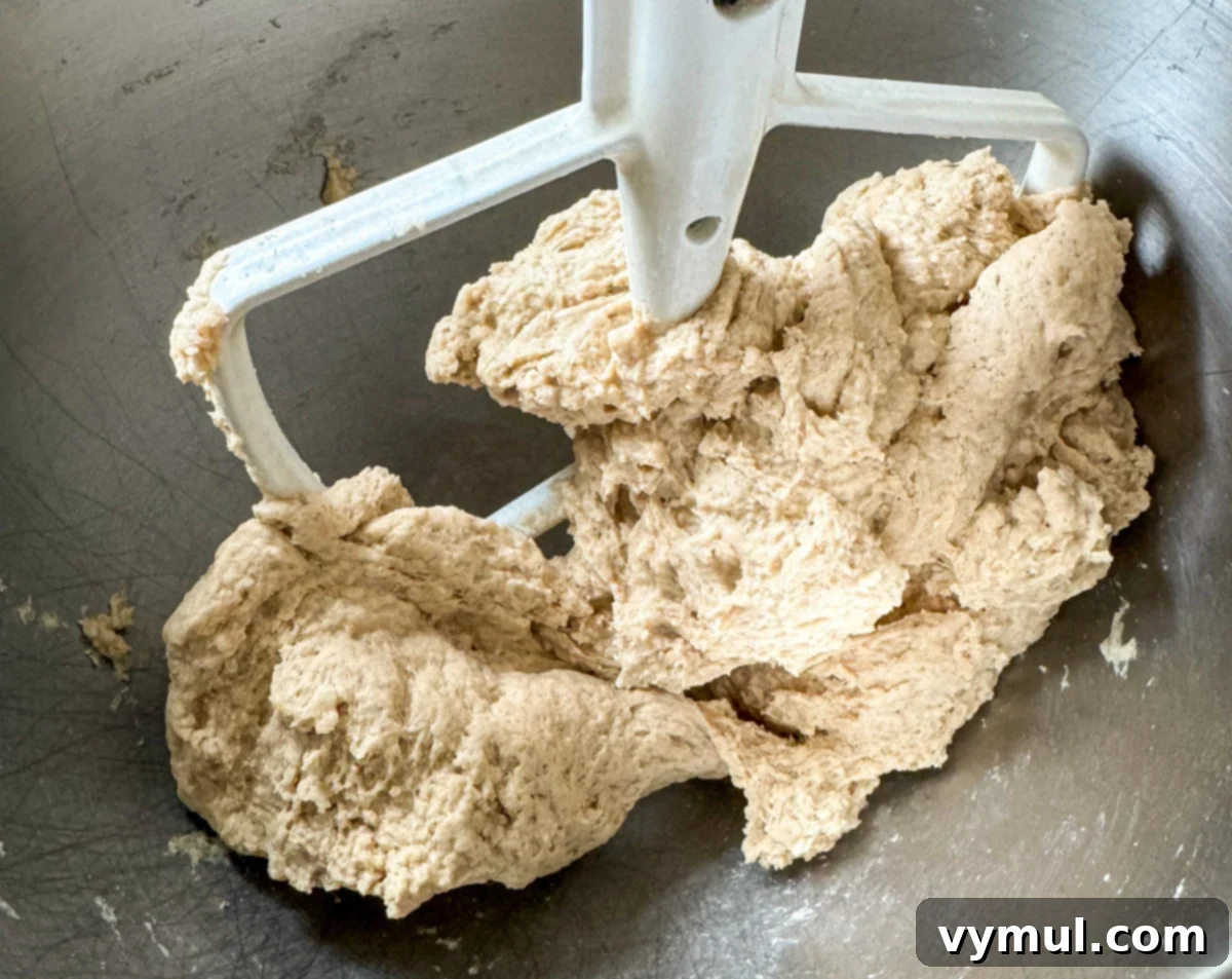 Homemade Soft Pretzels: Quick and Easy in 30 Minutes 5 soft pretzel dough coming together in stand mixer, forming a ball