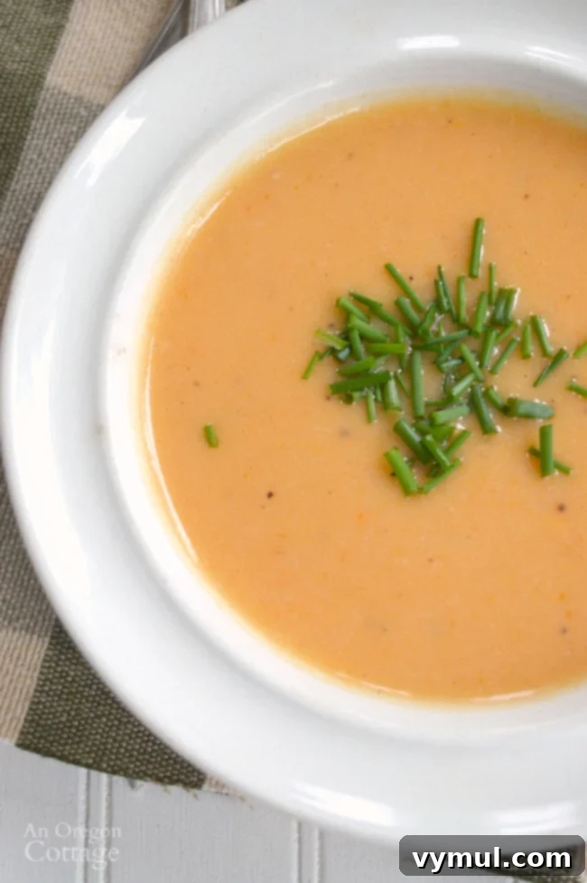 Amazing 30-Minute Cauliflower Cheese Soup 3 A child happily enjoying a bowl of quick and easy cauliflower cheese soup, unaware of the hidden vegetables.