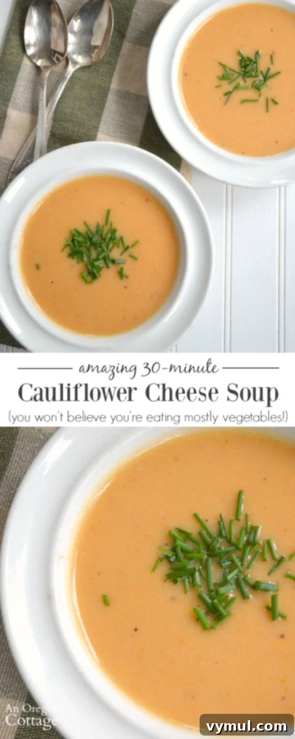 Amazing 30-Minute Cauliflower Cheese Soup 7 A bowl of cauliflower cheese soup on a wooden table, emphasizing its cheesy and delicious nature, ready in 30 minutes and full of healthy vegetables.