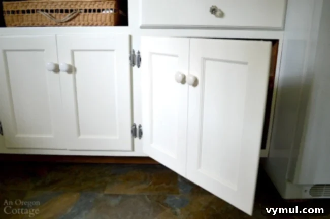DIY Beadboard Faux Double Door Electrical Panel Cover 11 Mudroom Makeover: Close-up of the cabinet featuring the cleverly designed faux double door, maintaining aesthetic harmony.