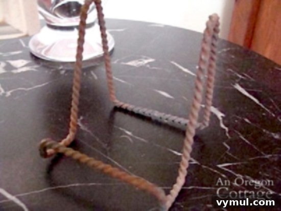 Close-up of the painted DIY Wood trim table clock stand.