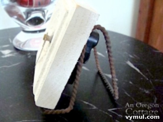 Side view of the DIY Wood trim table clock, showing how it rests on its stand.