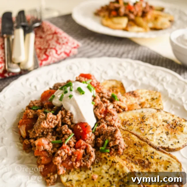 Speedy Cajun Beef and Rustic Spiced Potatoes 5 Plated Cajun beef on spice potatoes, showing the presentation with the creamy topping.