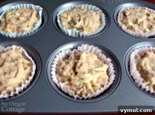 Spiced Zucchini Freezer Muffins 5 Frozen zucchini muffin dough cups in liners, placed back into a muffin tin, ready to be baked from frozen.