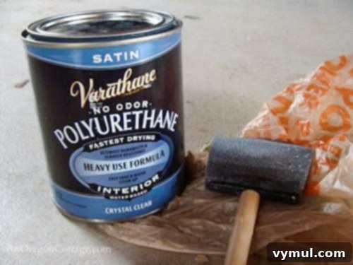 polyurethane used to protect table top-step7: A can of water-based polyurethane, ready to be applied as a protective finish to the stained dining table top.