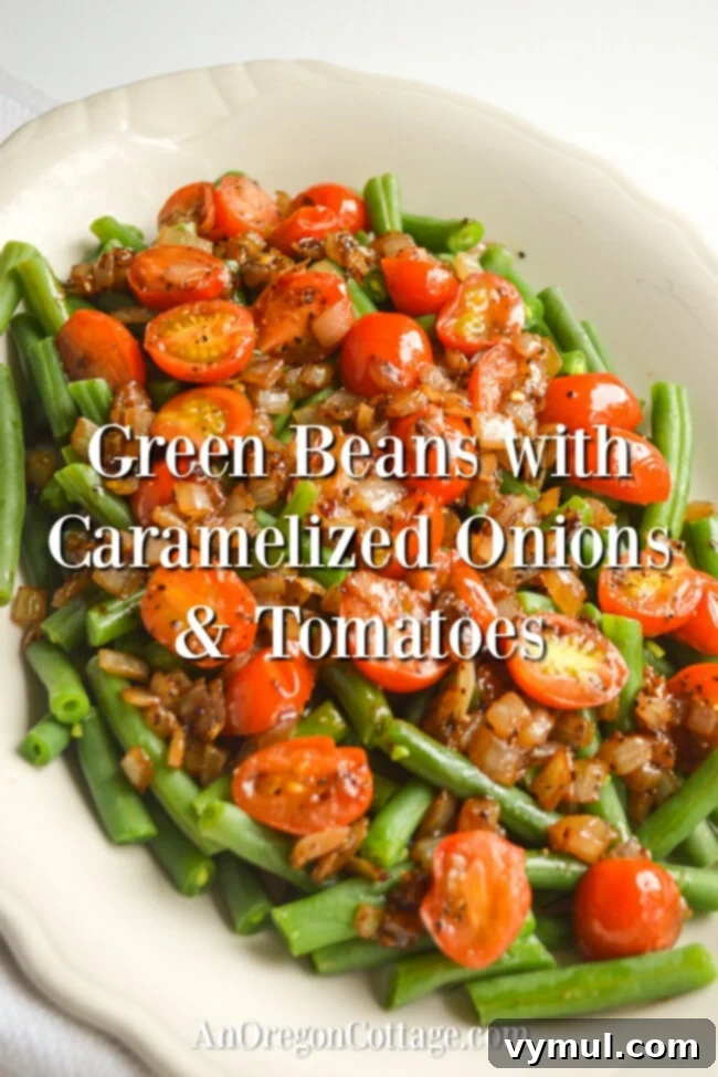 Speedy Healthy Green Bean Delight with Caramelized Onions and Tomatoes 2 Freshly cooked green beans with balsamic caramelized onions and tomatoes on a serving plate, ready to eat.