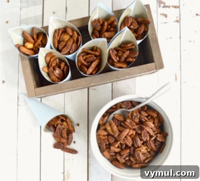 Sweet & Spicy Sriracha Nuts 3 Serving cones filled with Sriracha-Honey Nut Mix, perfect for game day or parties