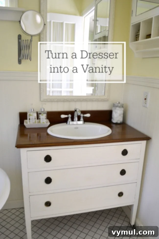 Upcycle a Dresser into a Beautiful Vanity 2 Vintage dresser used as a bathroom vanity with a self-rimming sink and white faucet