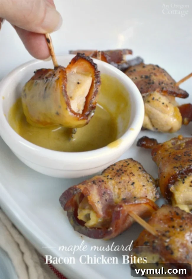 Maple Mustard Glazed Chicken Bacon Bites 2 Dipping Maple mustard bacon chicken bites into sauce