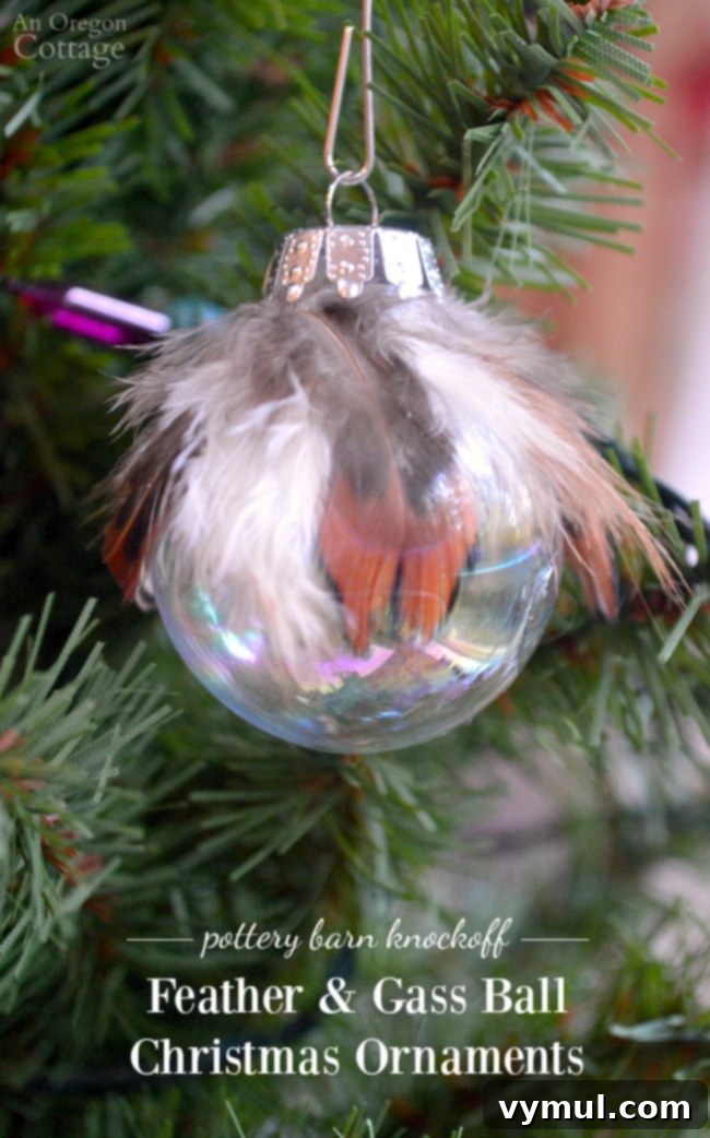 Effortless Feather & Glass Christmas Ornament Craft 2 Feather and glass ball Christmas ornament hanging on tree, showcasing elegant DIY decor.