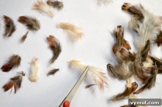 Effortless Feather & Glass Christmas Ornament Craft 4 Preparing feathers for the feather ball Christmas ornament DIY, sorting and trimming.