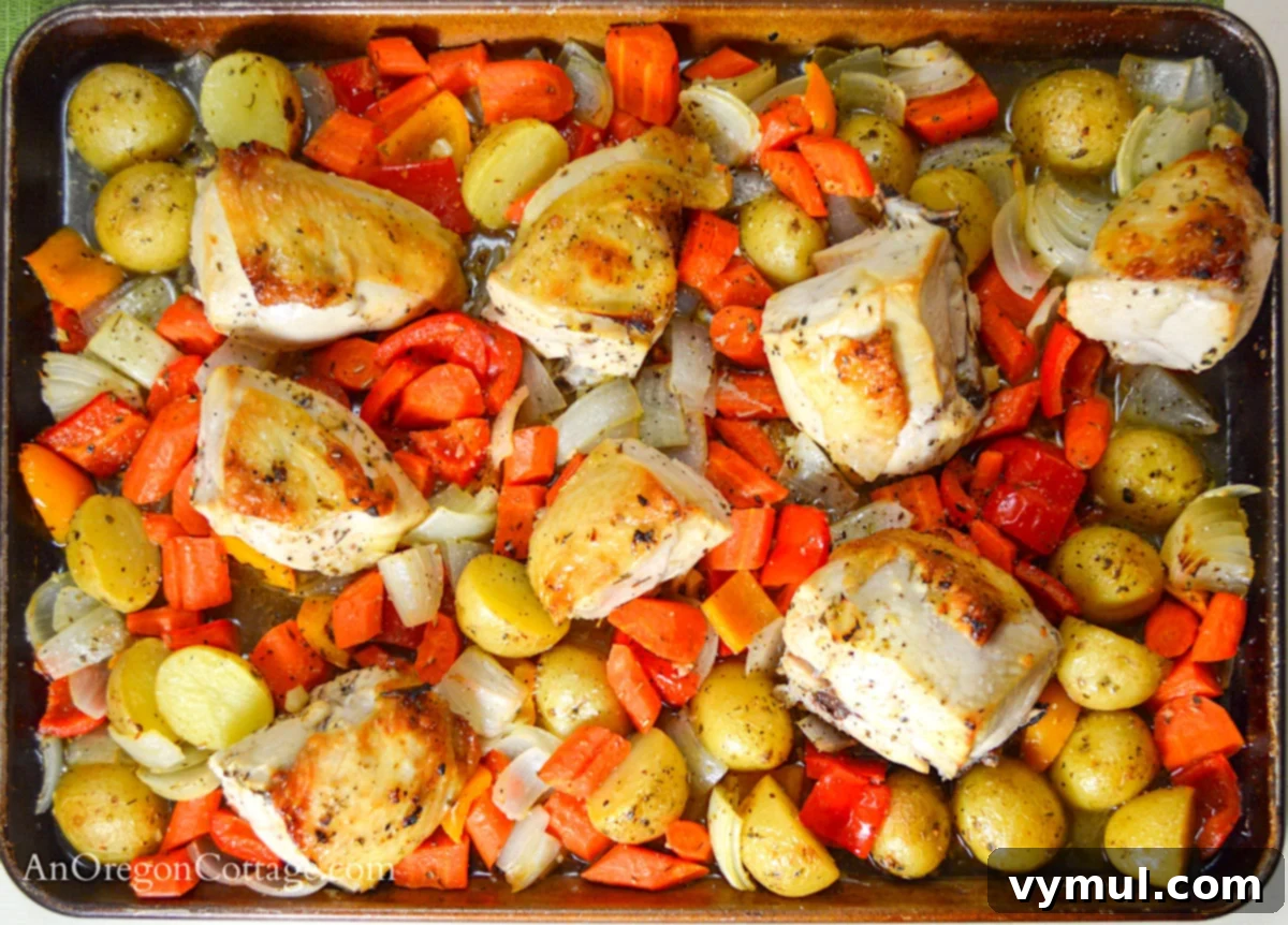 Sheet pan lemon roasted chicken and vegetables in pan above