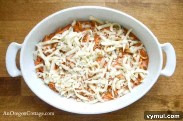 First layer of simple baked pasta in baking dish