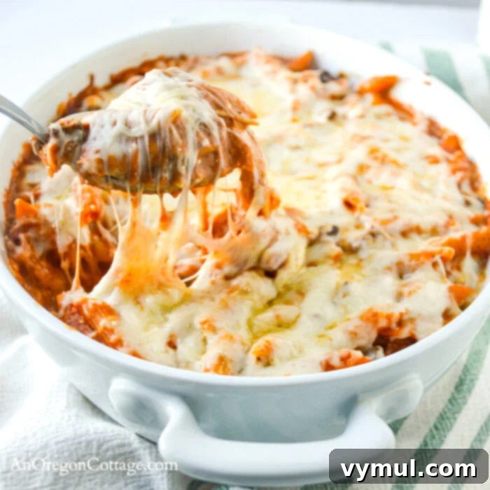 Serving a portion of simple baked pasta from the dish