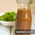 One Easy Vinaigrette Recipe Infinite Flavor Options 13 A small glass bottle of homemade vinaigrette dressing