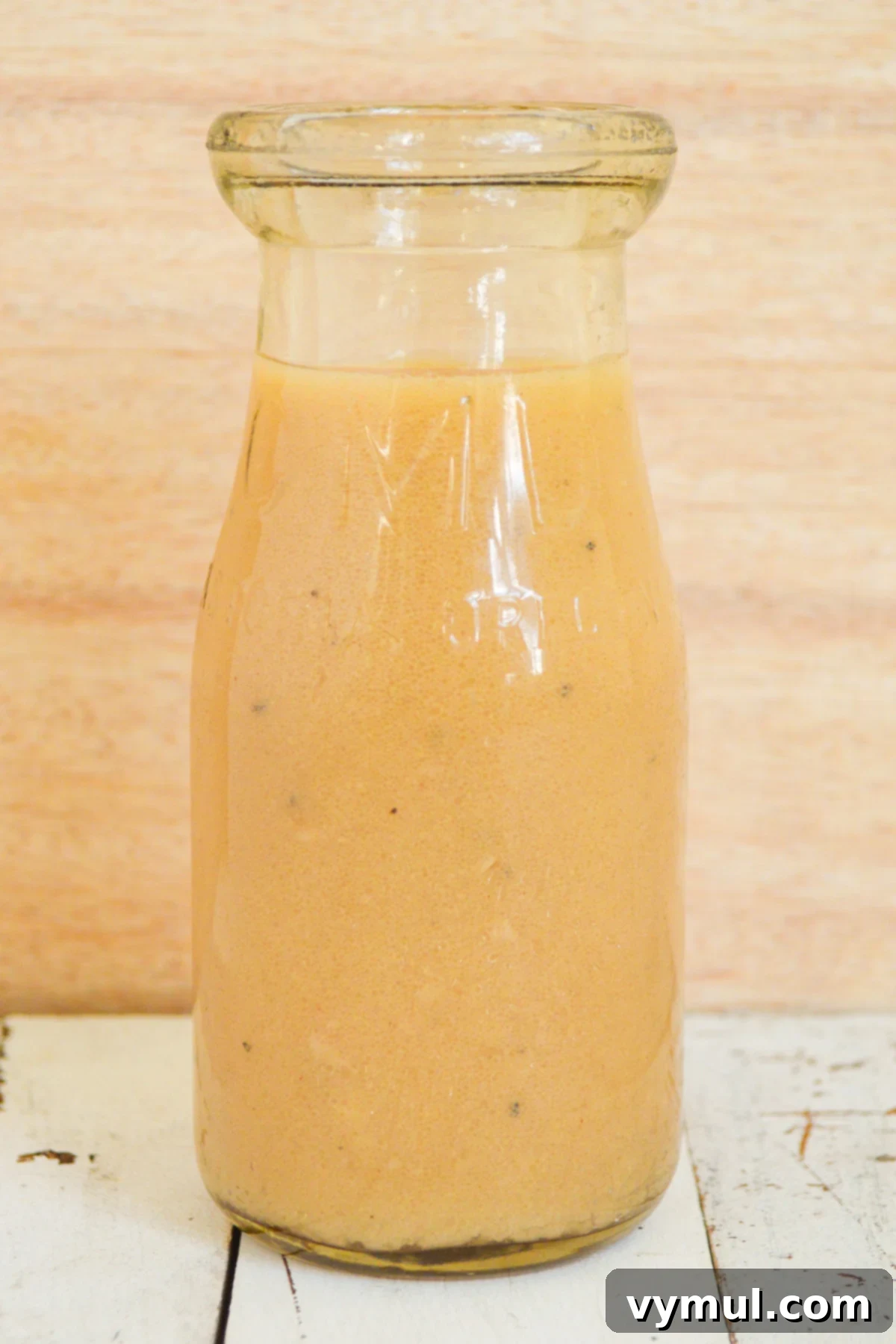 One Easy Vinaigrette Recipe Infinite Flavor Options 4 Basic vinaigrette mixed in a glass bottle, ready for use