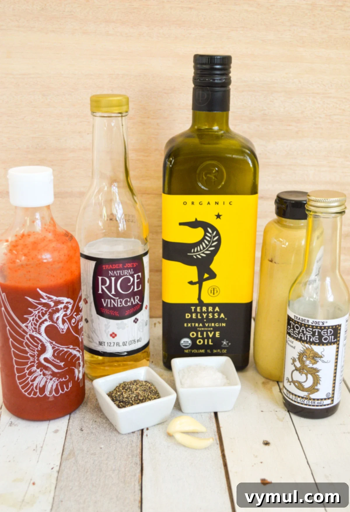 One Easy Vinaigrette Recipe Infinite Flavor Options 9 Ingredients for Asian vinaigrette dressing: olive oil, rice vinegar, sesame oil, Dijon mustard, sriracha, garlic, salt, pepper