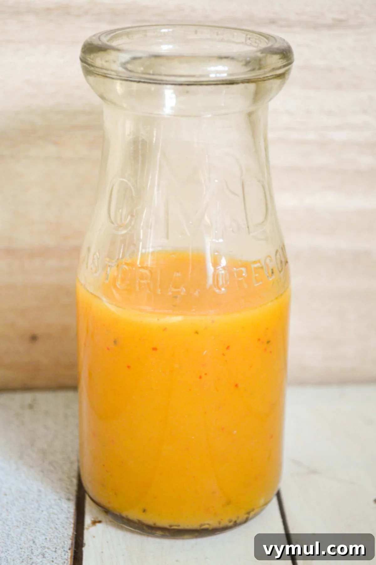 One Easy Vinaigrette Recipe Infinite Flavor Options 10 Asian style salad dressing in a glass bottle