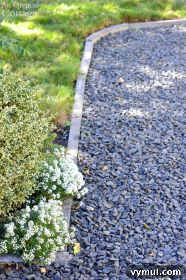 Simple, Budget-Friendly Concrete Edging for Your Garden Beds and Paths 14 Cement Garden Edging-curved gravel walkway