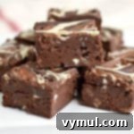 Make this quadruple chocolate decadent brownie recipe for moist and delicious results