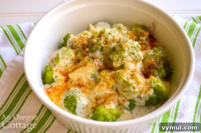 Velvety Broccoli Cauliflower Parmesan Bake 9 Close-up of the finished creamy broccoli cauliflower parmesan, with golden cheese and tender florets