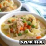 Homemade Turkey Noodle Soup in bowls, showcasing the delicious, comforting meal.