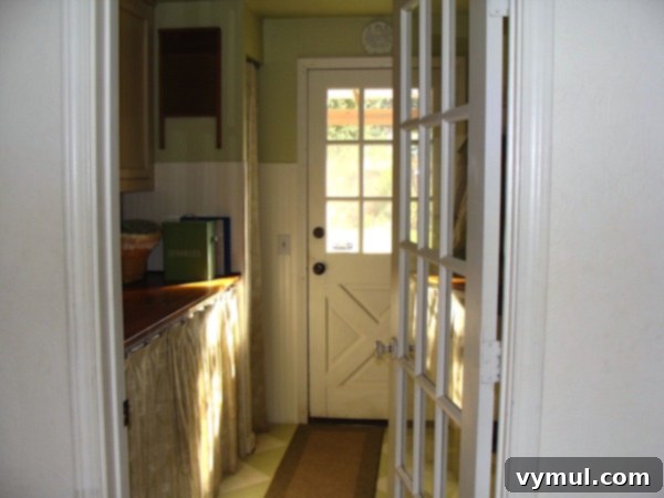 Our Garage Becomes a Dream Laundry & Mudroom 5 Remodeled Garage Laundry Room Entrance with French Door