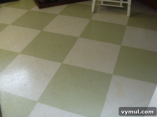 Our Garage Becomes a Dream Laundry & Mudroom 9 Laundry Green-Cream Checkerboard Floor - Scratched, Awaiting Refinish