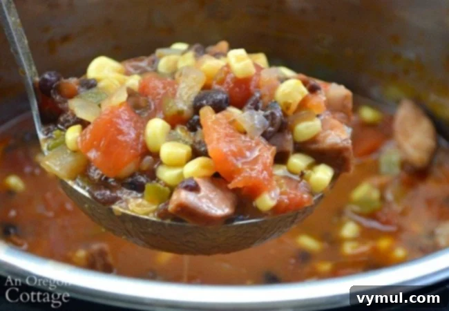 Black Bean Sausage Soup on ladle