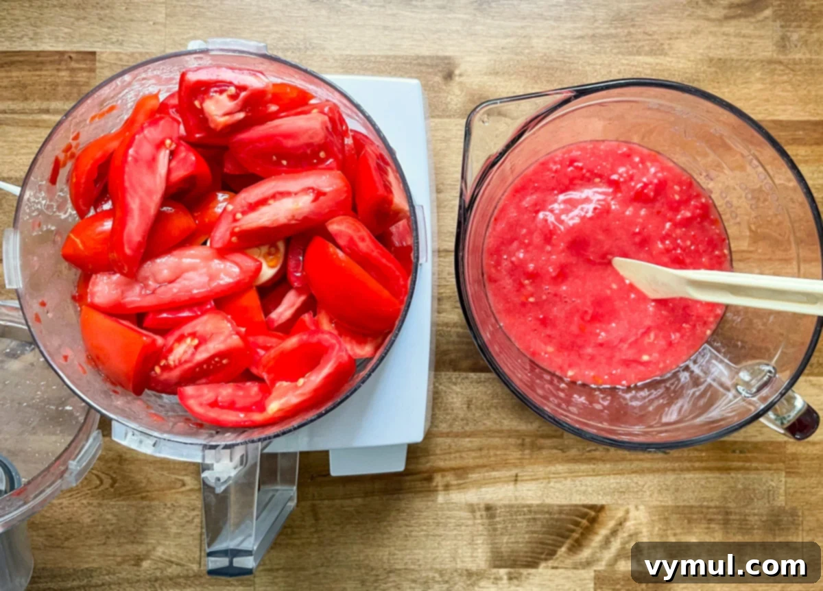 Tomatoes being chopped in a food processor for quick salsa preparation, showcasing the efficiency of modern kitchen tools.