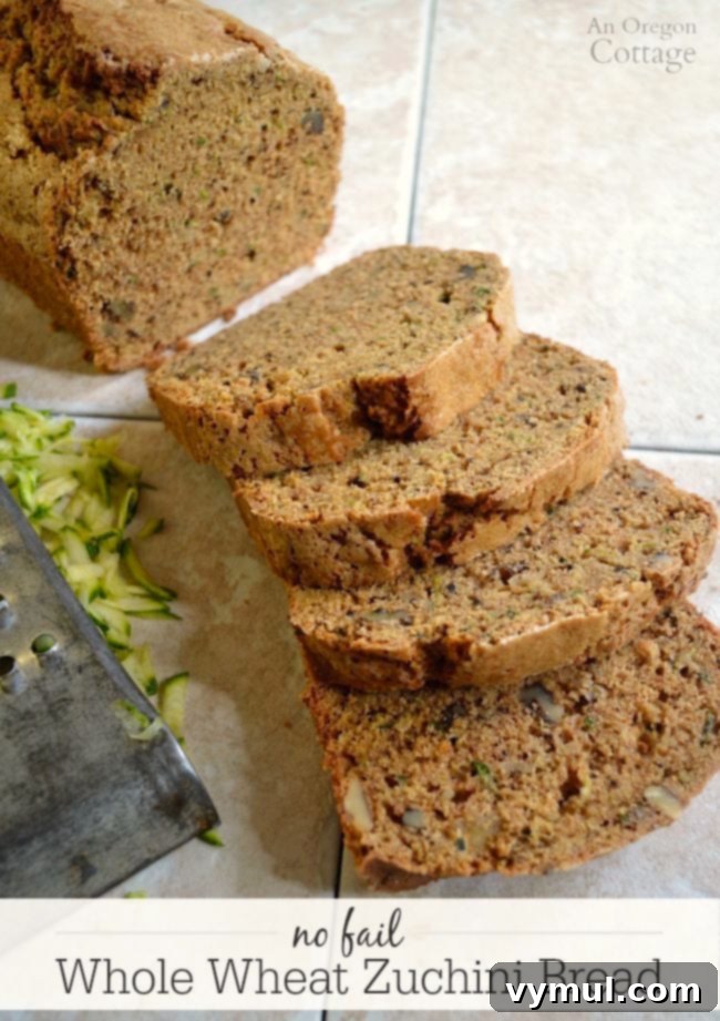 Healthy Whole Wheat Zucchini Bread sliced, showing its moist texture and golden crust