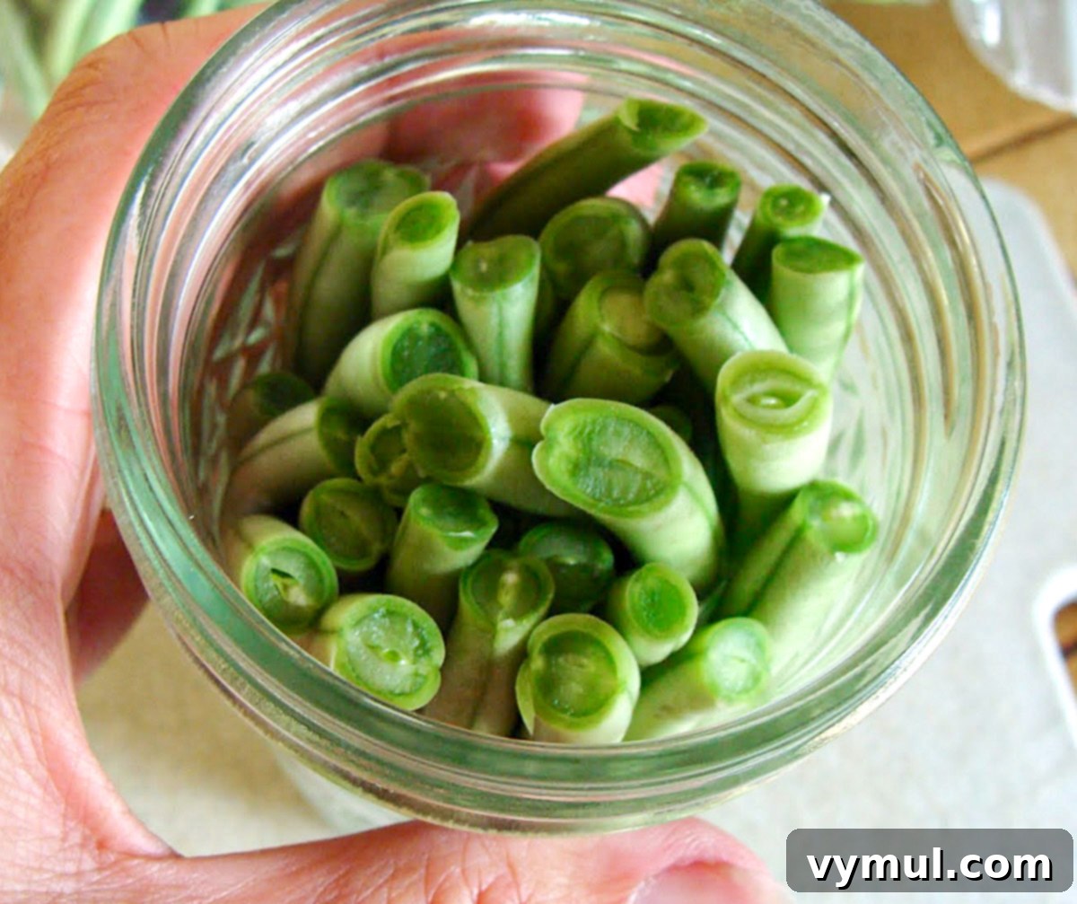 green beans packed in a canning jar
