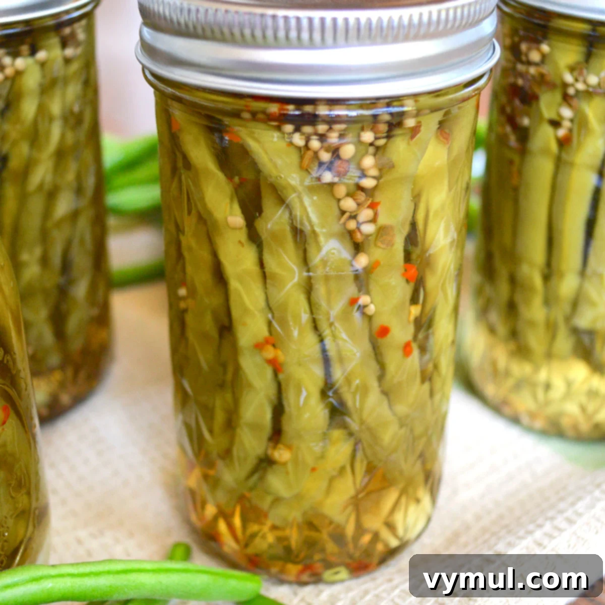 jars of canned pickled beans