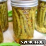 jars of canned pickled beans