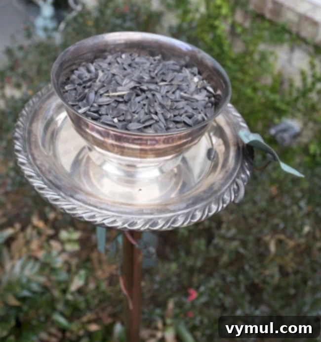 15 Easy and Beautiful Handmade Garden Gifts 12 DIY Thrifted Bird Feeder @ Nourish & Nestle