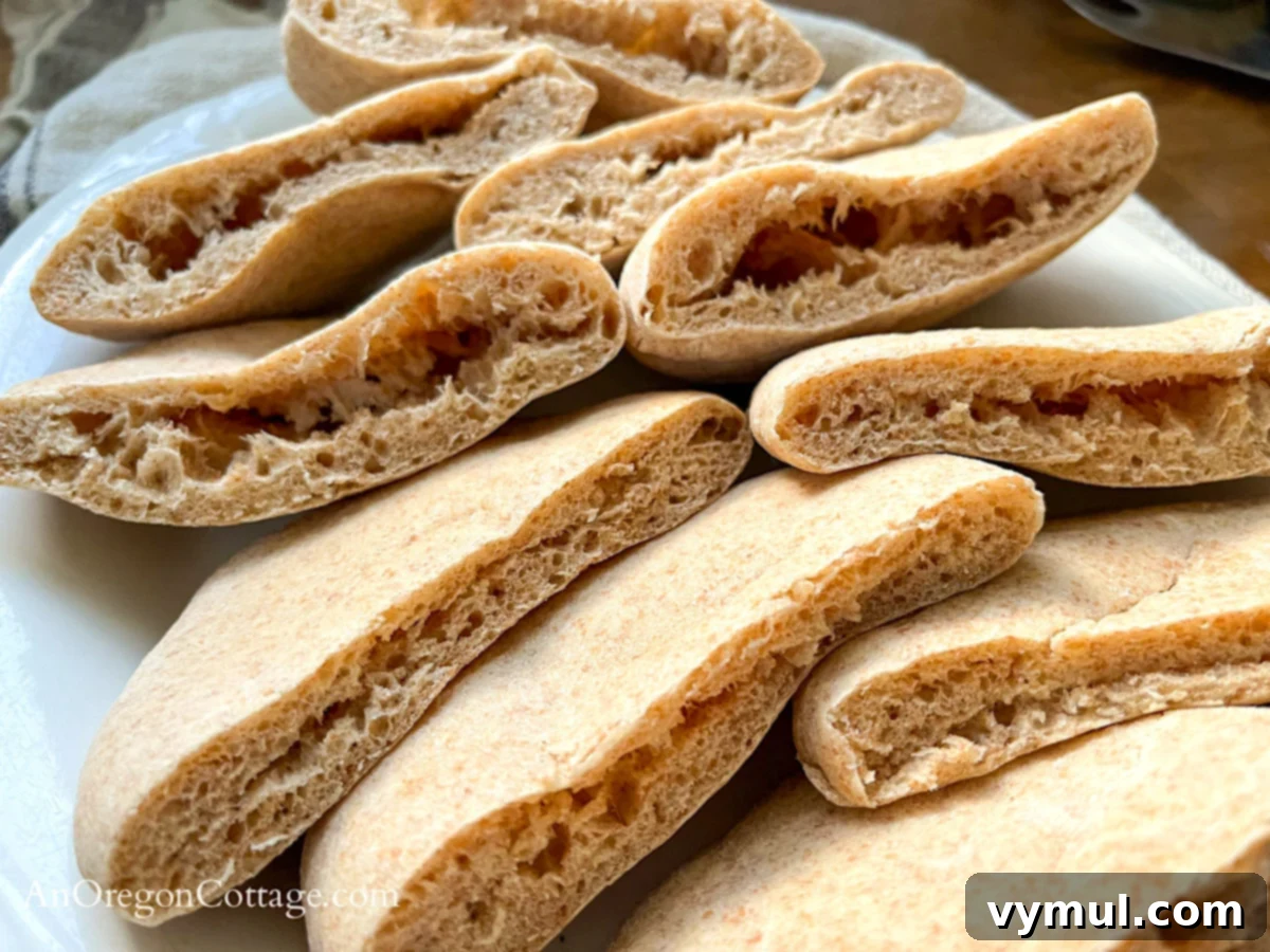 Simple Wholesome Homemade Pita 3 cut pita bread on white platter close