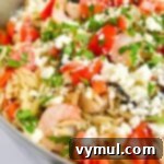 Shrimp Orzo with Feta and Vegetables in a Skillet