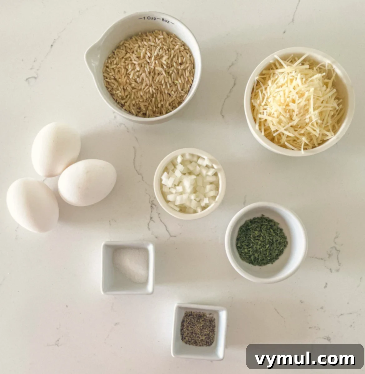 Savory Parmesan Rice Cakes Made Easy 4 ingredients for rice patties on marble