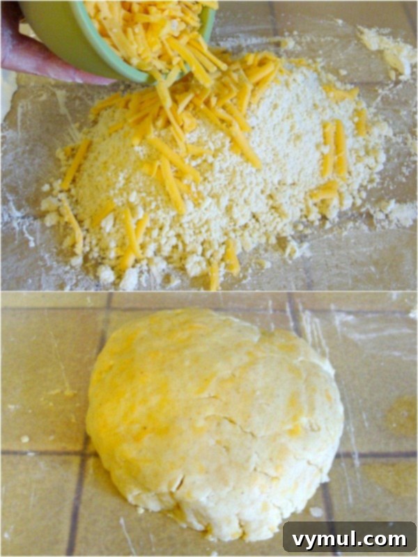 Close-up of the cheesy crust dough, ready to be rolled and cut for ham pie.