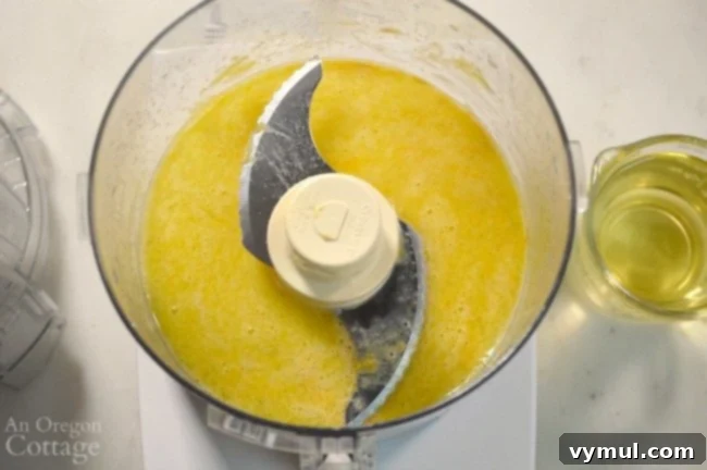 Food Processor Homemade Mayonnaise ingredients blended before oil addition