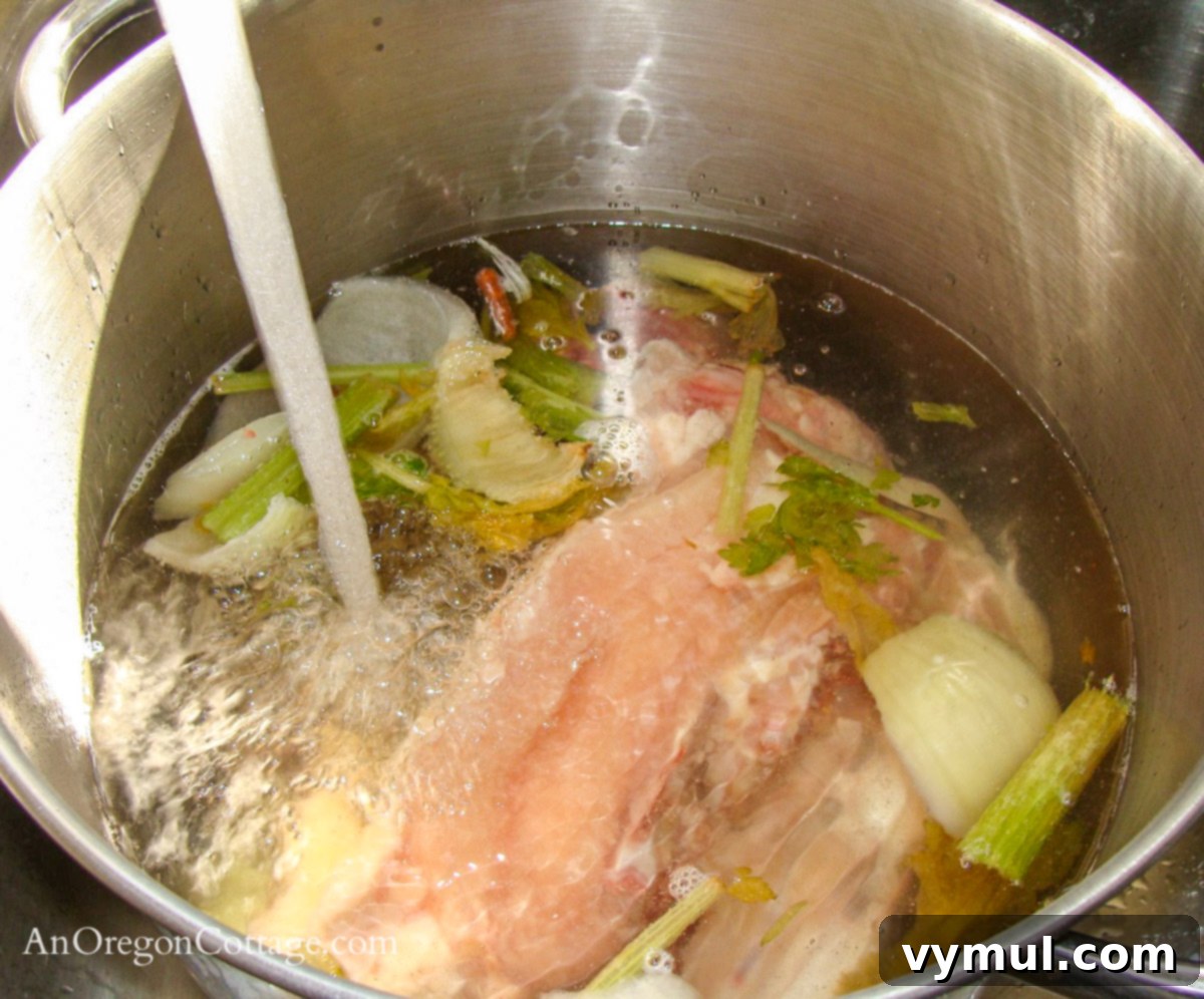 adding water for chicken stock