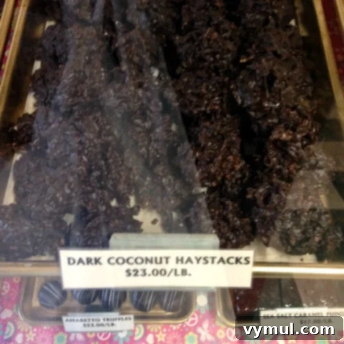 Effortless 3-Ingredient Low Sugar Dark Chocolate Coconut Clusters 3 Candy store dark chocolate coconut clusters priced at $23 a pound.