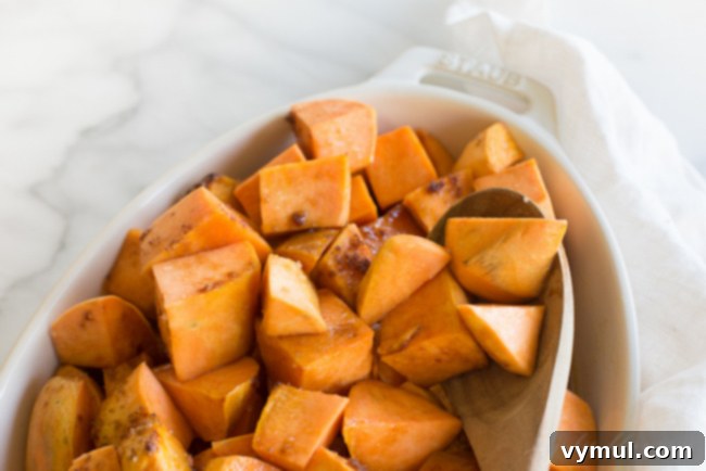 Thanksgiving Crunch Time: 23 Last-Minute Ideas for Doing, Dining, & Discovering 13 roasted-sweet-potatoes-side-dish, a vibrant bowl of roasted sweet potatoes, perfectly caramelized and seasoned, a healthy and delicious side dish.