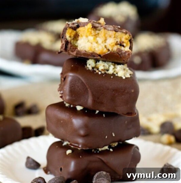 Thanksgiving Crunch Time: 23 Last-Minute Ideas for Doing, Dining, & Discovering 17 thanksgiving-chocolate-covered-pumpkin-pie-bites, bite-sized chocolate-covered pumpkin pie, elegantly presented, a delightful and decadent Thanksgiving dessert.