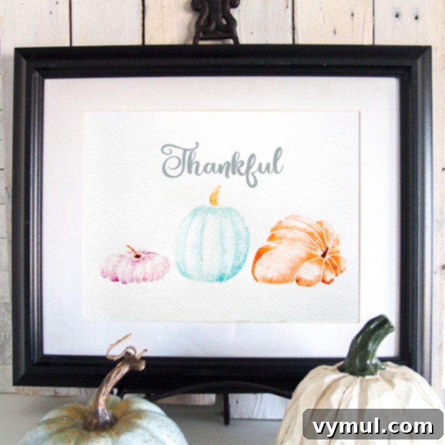 Thanksgiving Crunch Time: 23 Last-Minute Ideas for Doing, Dining, & Discovering 20 Watercolor-pumpking-fall-printable-art-Thankful, a beautiful watercolor pumpkin and fall foliage art print, with the word 'Thankful,' perfect for seasonal home decor.