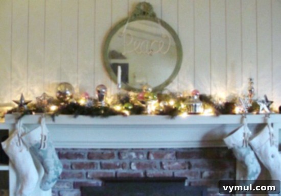 2010 Christmas Mantel: A festive mantelpiece adorned with metallic decorations, creating a shimmering and elegant holiday display.