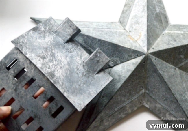 Create a Faux Galvanized Finish Step-by-Step Guide 9 Comparing a faux galvanized painted house to a real galvanized metal barn star for accurate weathering.