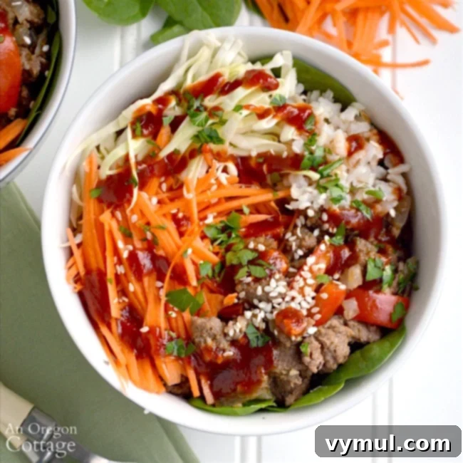 Sriracha Beef & Veggie Rice Bowls for Quick Weeknight Flavor 8 White bowl filled with diced vegetables and cooked ground beef, ready for assembly