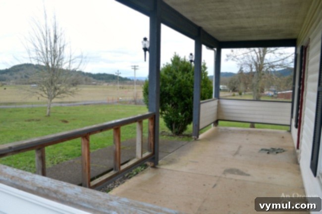 Farmhouse porch view into yard